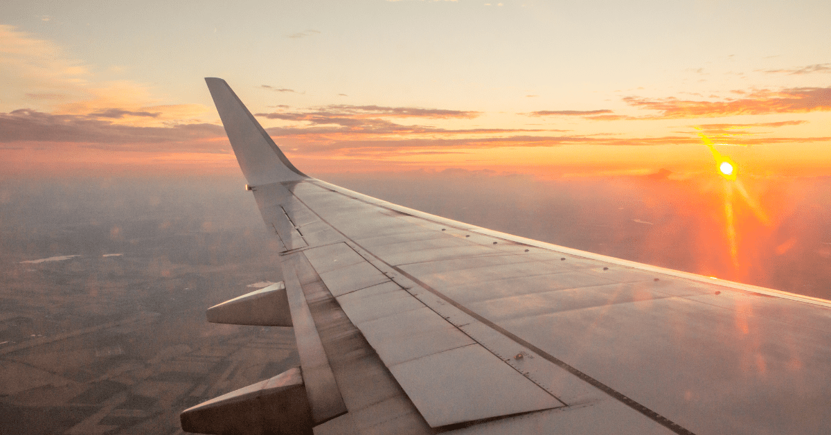 Sunset photo over an aeroplane wing