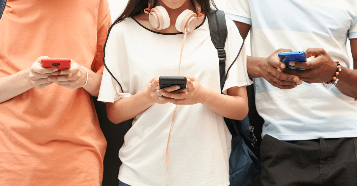 Students texting on their phones