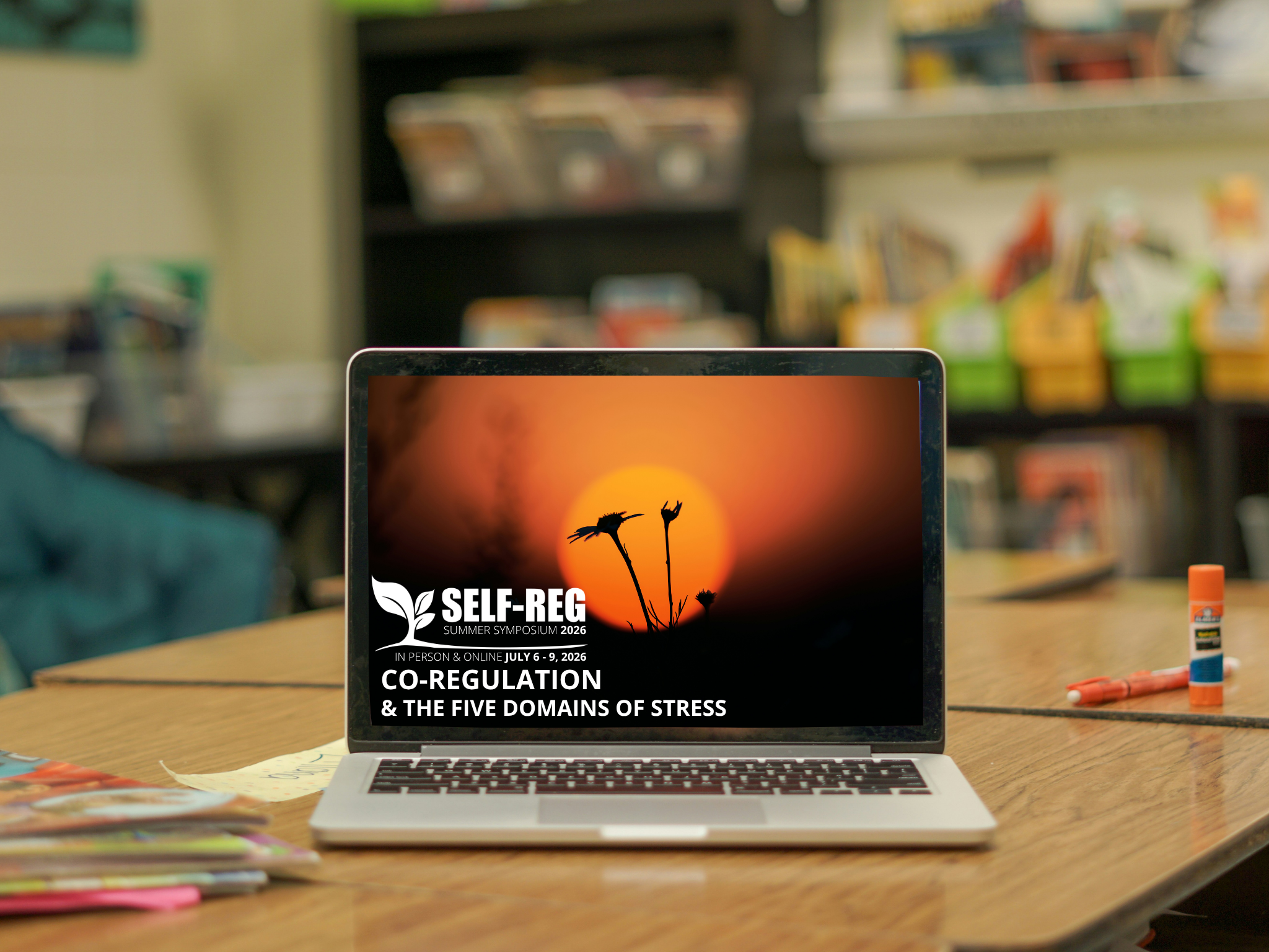Laptop displaying the Self-Reg Summer Symposium 2026 as a reminder of how co-regulation helped reduce stress during unexpected Wi-Fi challenges.